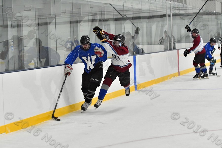 Wheaton College Men\'s Ice Hockey vs Middlesex Community College. - Photo By: KEITH NORDSTROM